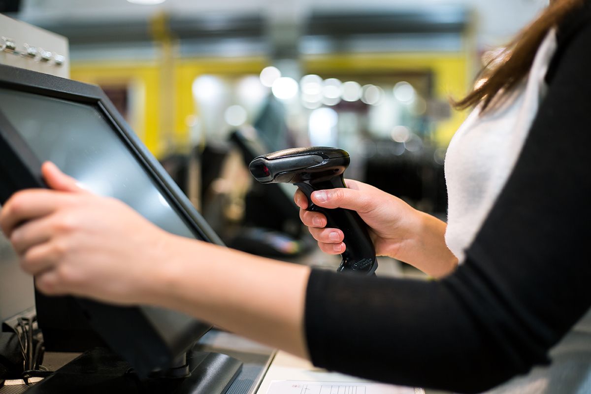 A customer using a POS system.
